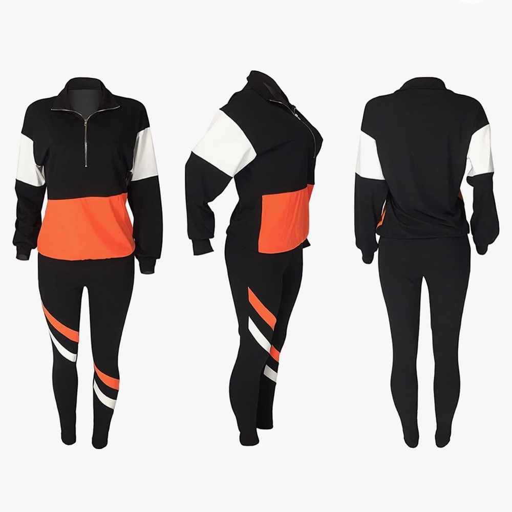 Two piece track suit; Size L; orange/black